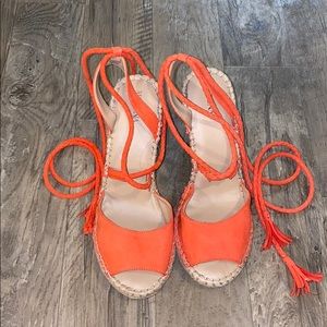 Strappy orange wedges